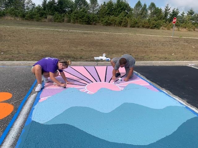Creativity was on display as Eastport-South Manor Jr.-Sr. High School students painted their parking spaces.